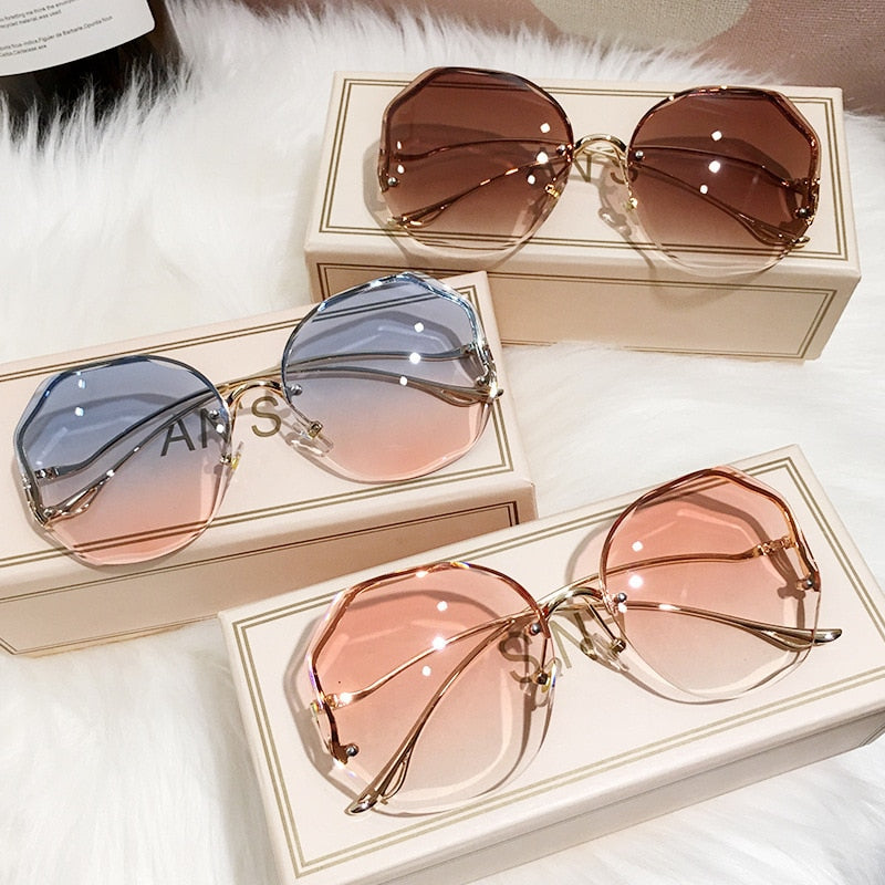 Round, Rimless, Bug-Eye Sunglasses