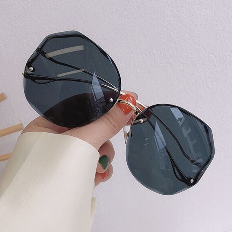 Round, Rimless, Bug-Eye Sunglasses